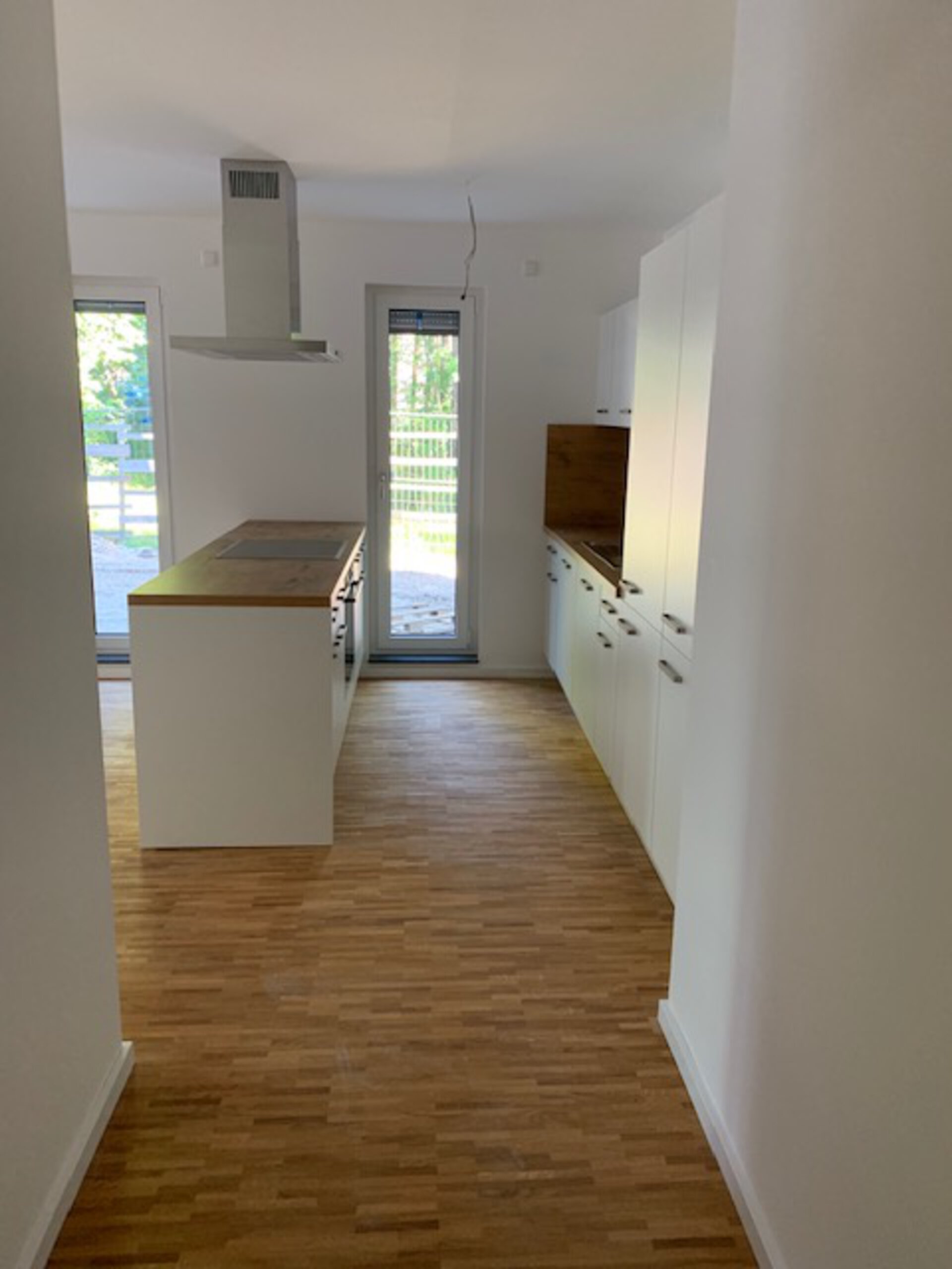 Flur mit Blick in die Küche | © Dawonia