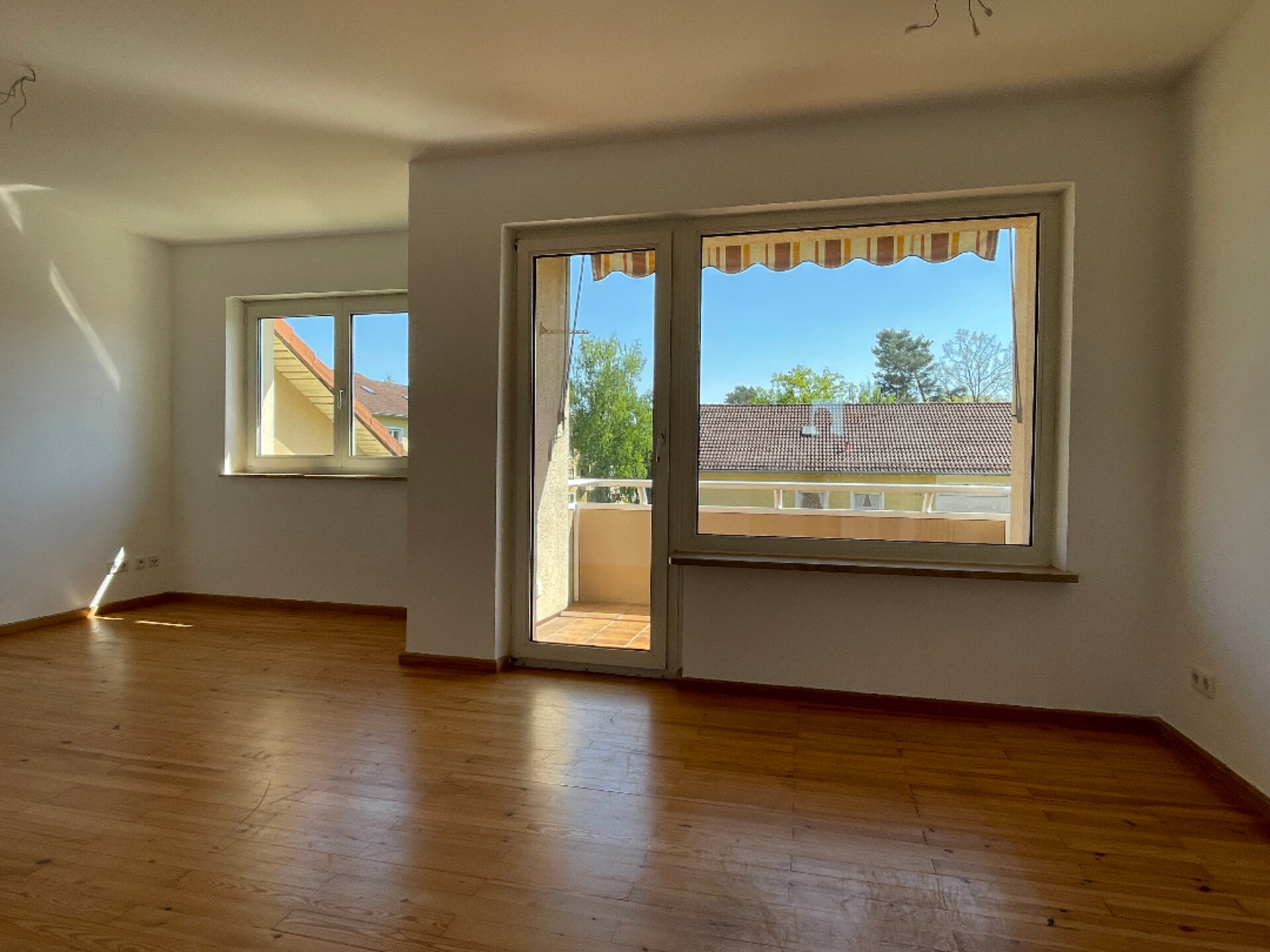 Wohnzimmer mit Balkon | © Dawonia