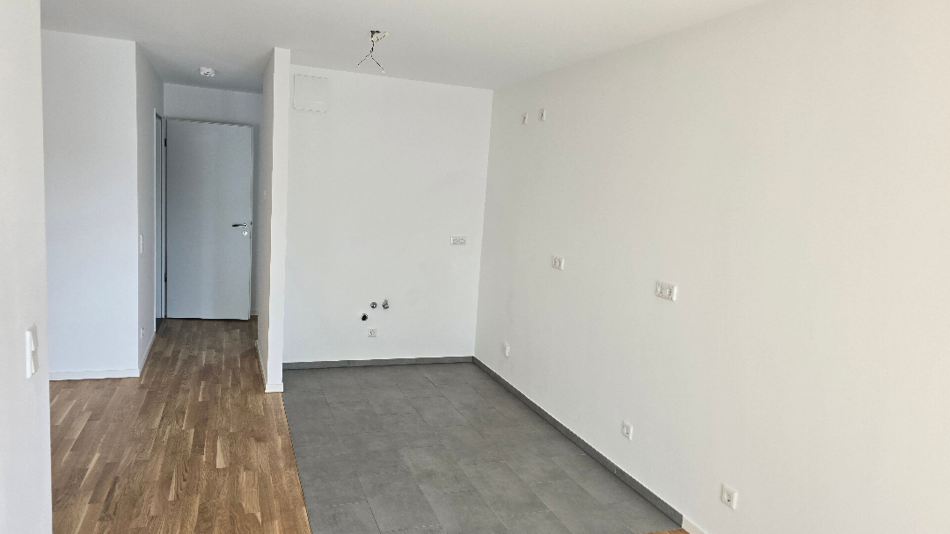 Wohnzimmer mit offener Küche | © Dawonia