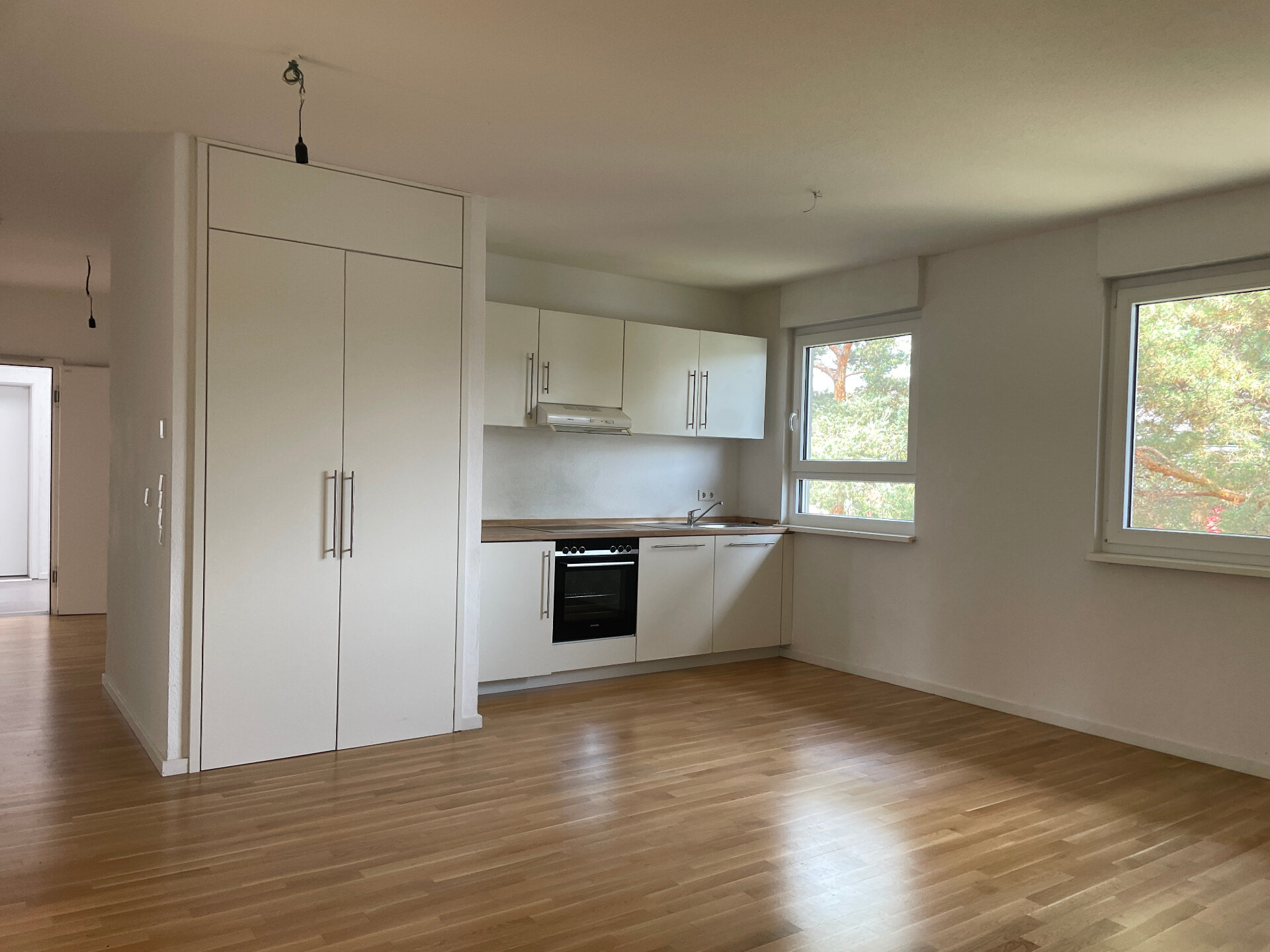 Wohnzimmer mit offener Küche | © Dawonia