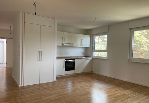 Wohnzimmer mit offener Küche | © Dawonia