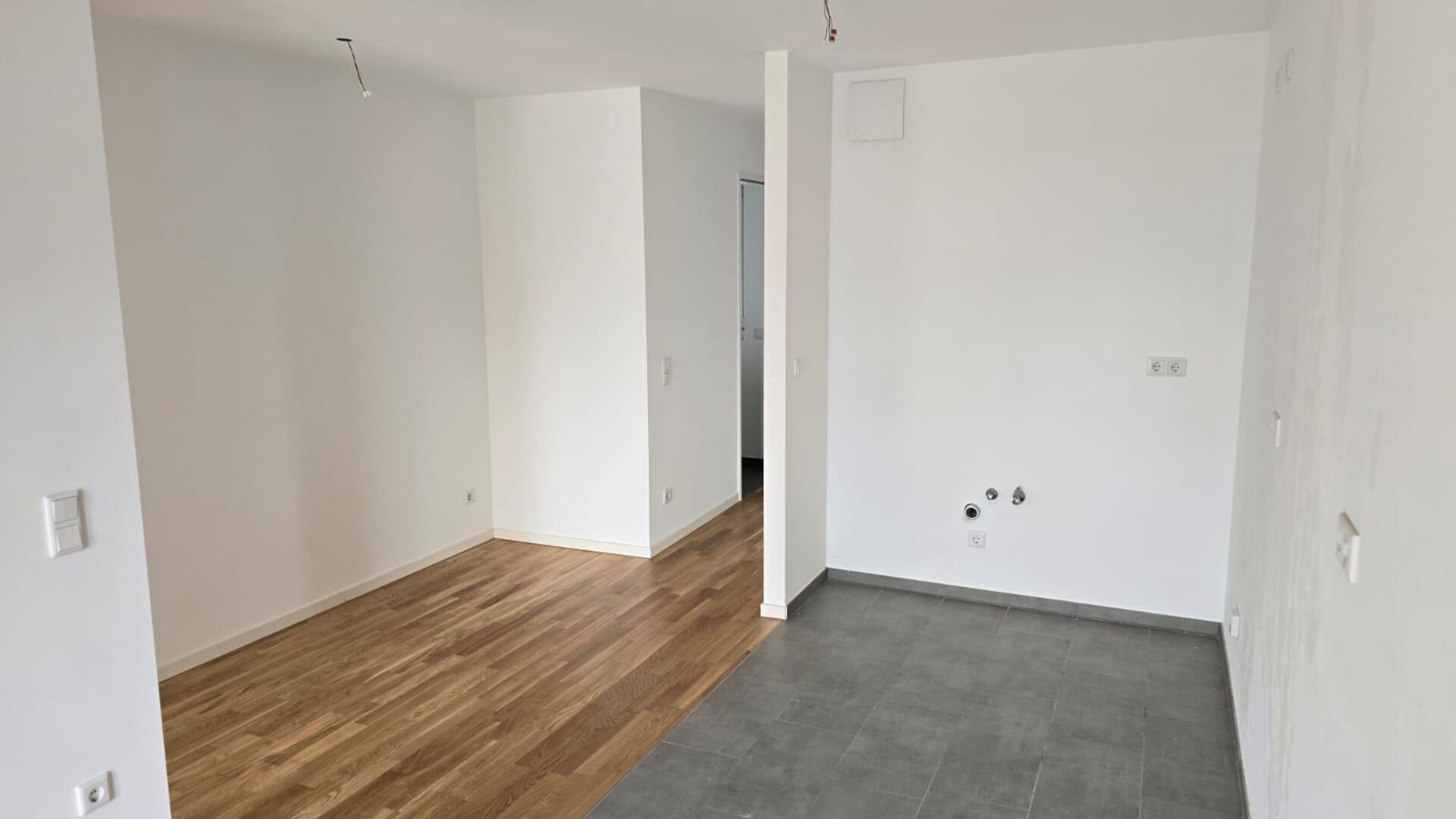 Wohnzimmer mit offener Küche | © Dawonia