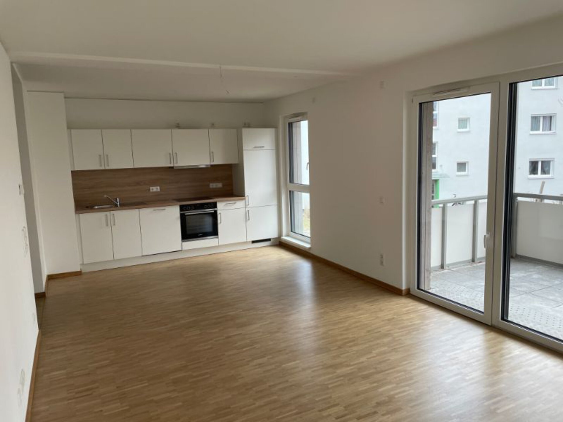 Wohnzimmer mit Küche | © Dawonia