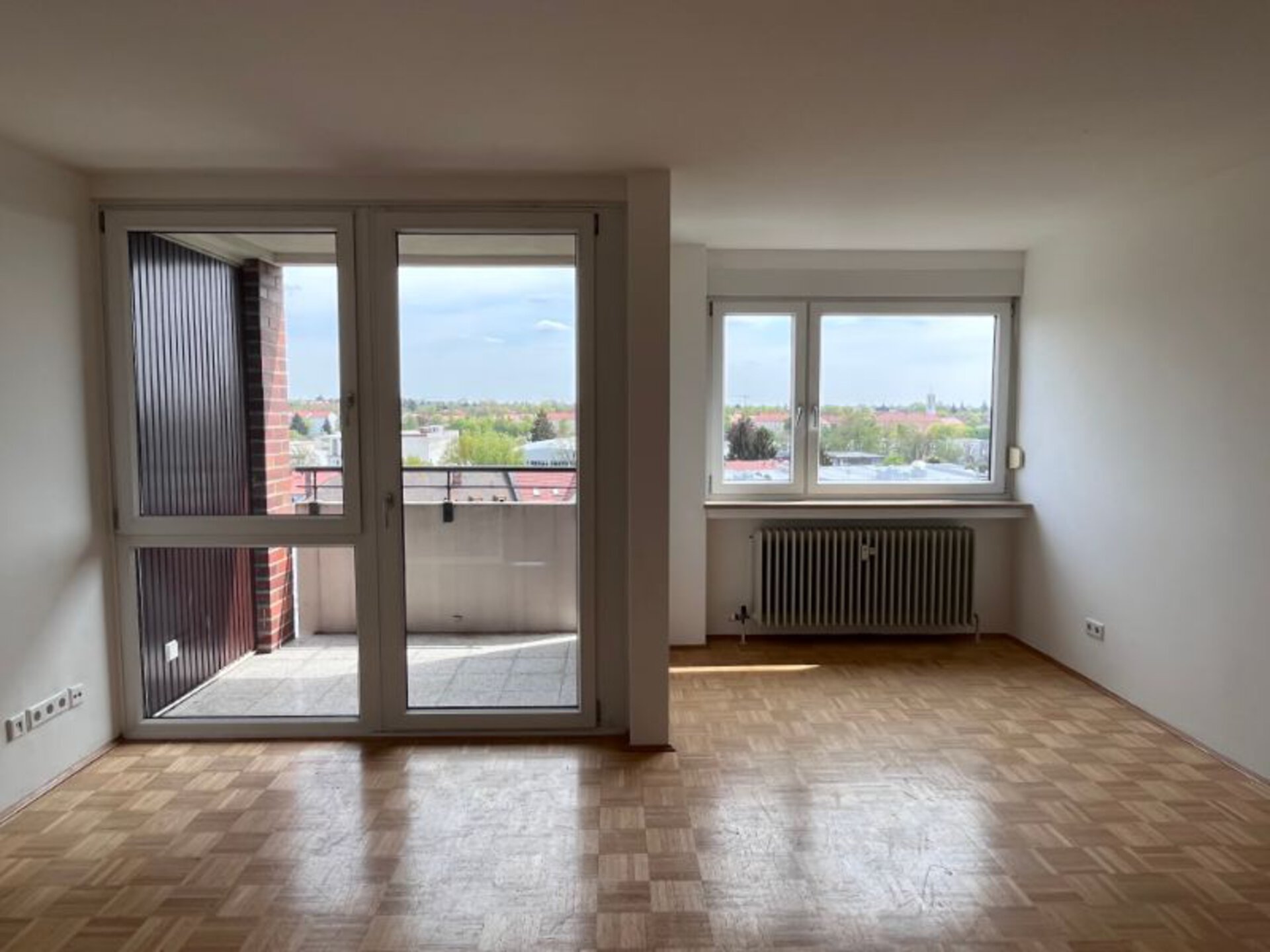 Wohnzimmer mit Balkon | © Dawonia